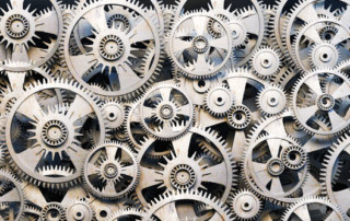 Grijze radertjes in een machine